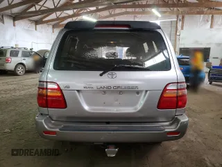 1999 Toyota Land Cruiser with VIN JT3HT05J1X0038590, listed as a Copart auction lot 87452404 with 232,244 mi miles and Salvage Title. Bid and sale history available at carsss.com. Image 6.