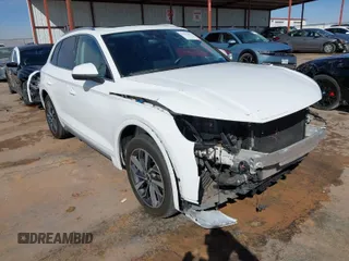 2021 Audi Q5 Premium Plus with VIN WA1BAAFYXM2125942, listed as a IAAI auction lot 41671026 with 63,804 mi miles. Bid and sale history available at carsss.com. Image 1.