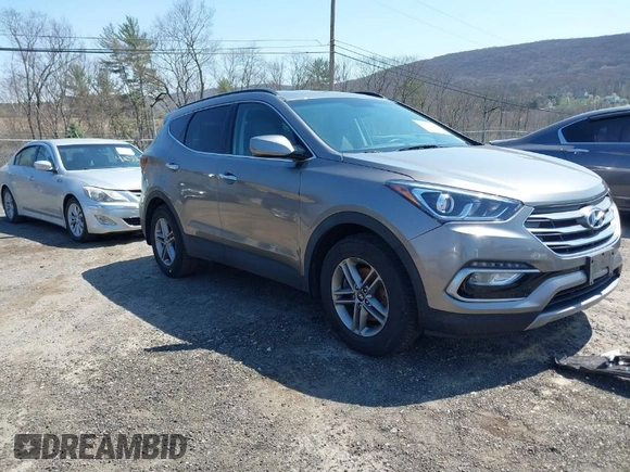 2017 Hyundai Santa Fe 2.4L z VIN 5NMZUDLB7HH015347, wystawiony jako IAAI lot #42035606 z przebiegiem 118 305 mil mil oraz . Historia ofert i sprzedaży dostępna na DreamBid. Obrazek 1.
