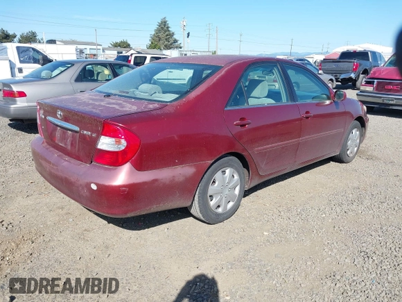 2003 Toyota Camry LE with VIN 4T1BE32K33U147710, listed as a IAAI auction lot 42184705 with 305,390 mi miles and . Bid and sale history available at DreamBid. Image 4.