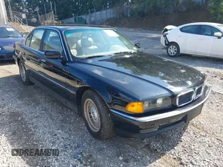 1995 BMW 7 Series 740i with VIN WBAGF6327SDH08206, listed as a IAAI auction lot 42857077 with 93,513 mi miles and . Bid and sale history available at DreamBid. Image 1.