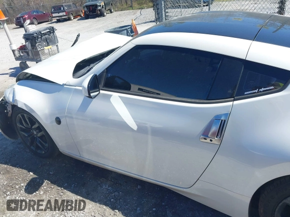 2015 Nissan 370Z Sport with VIN JN1AZ4EH9FM443719, listed as a IAAI auction lot 41677286 with 87,967 mi miles and . Bid and sale history available at DreamBid. Image 14.