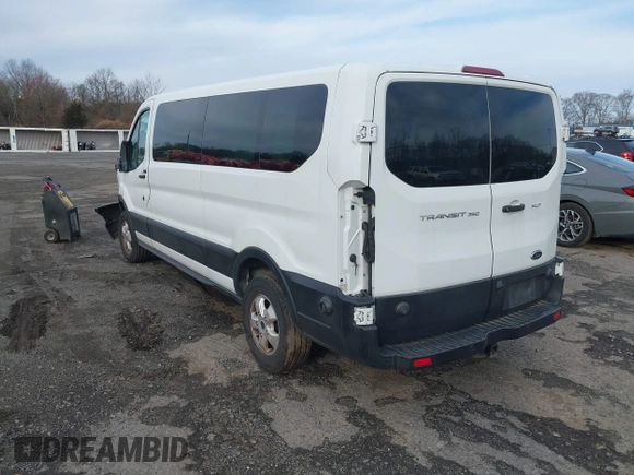 2019 Ford Transit Passenger XL z VIN 1FBZX2ZM2KKB63281, wystawiony jako IAAI lot #41859263 z przebiegiem 39 294 mil mil oraz . Historia ofert i sprzedaży dostępna na DreamBid. Obrazek 3.