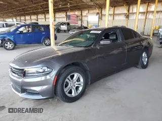 2020 Dodge Charger SXT with VIN 2C3CDXBG2LH211676, listed as a Copart auction lot 64330565 with 104,877 mi miles and Salvage title. Bid and sale history available at DreamBid. Image 1.