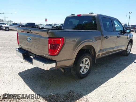 2023 Ford F-150 XL with VIN 1FTEW1C8XPFA61245, listed as a IAAI auction lot 42692758 with 50,935 mi miles and . Bid and sale history available at DreamBid. Image 4.