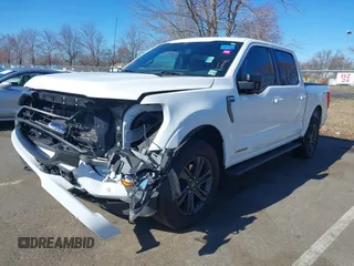 2023 Ford F-150 XL with VIN 1FTFW1ED0PFA18306, listed as a IAAI auction lot 41690965 with 49,988 mi miles. Bid and sale history available at carsss.com. Image 2.