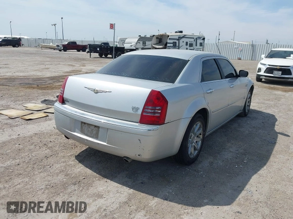 2005 Chrysler 300 with VIN 2C3JA63H05H693522, listed as a IAAI auction lot 41847279 with 162,037 mi miles. Bid and sale history available at carsss.com. Image 4.