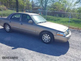 2004 Mercury Grand Marquis LS Premium with VIN 2MEFM75W44X656311, listed as a IAAI auction lot 41998194 with 289,710 mi miles. Bid and sale history available at carsss.com. Image 1.