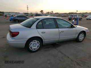 2001 Saturn SL z VIN 1G8ZK52761Z204012, wystawiony jako Copart lot #86618384 z przebiegiem 99 674 mil mil oraz Szkoda całkowita • Salvage title. Historia ofert i sprzedaży dostępna na DreamBid. Obrazek 3.