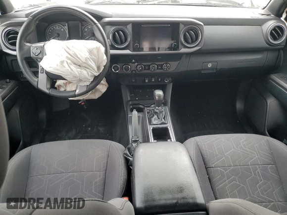 2019 Toyota Tacoma SR z VIN 3TMCZ5AN5KM242521, wystawiony jako Copart lot #55167485 z przebiegiem Nie podano mil oraz Szkoda całkowita • Salvage title. Historia ofert i sprzedaży dostępna na DreamBid. Obrazek 8.