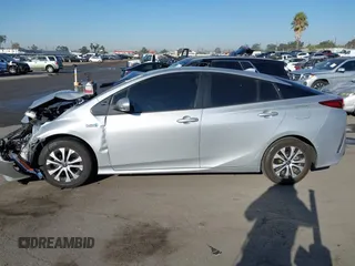 2022 Toyota Prius LE with VIN JTDKAMFP3N3209448, listed as a IAAI auction lot 40533784 with 116,436 mi miles and . Bid and sale history available at DreamBid. Image 14.