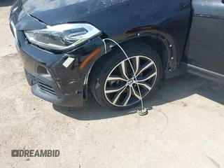 2018 BMW X2 xDrive28i with VIN WBXYJ5C33JEF80454, listed as a IAAI auction lot 41876188 with 34,596 mi miles. Bid and sale history available at carsss.com. Image 6.