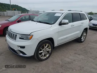 2014 Jeep Grand Cherokee Summit z VIN 1C4RJFJTXEC346627, wystawiony jako IAAI lot #42332200 z przebiegiem 231 007 mil mil oraz . Historia ofert i sprzedaży dostępna na DreamBid. Obrazek 2.