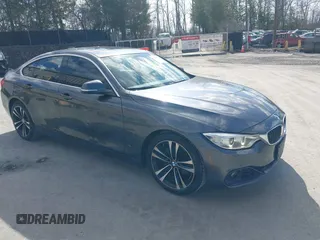 2016 BMW 4 Series 428i xDrive with VIN WBA4C9C56GG140427, listed as a IAAI auction lot 41886670 with 94,426 mi miles and . Bid and sale history available at carsss.com. Image 1.