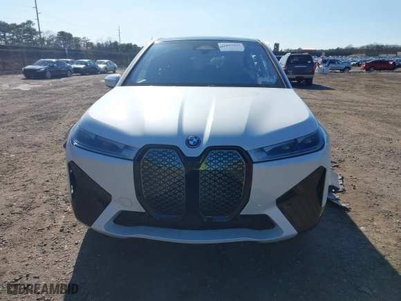 2023 BMW iX xDrive50 with VIN WB523CF0XPCM07644, listed as a IAAI auction lot 41867027 with 18,759 mi miles. Bid and sale history available at carsss.com. Image 13.