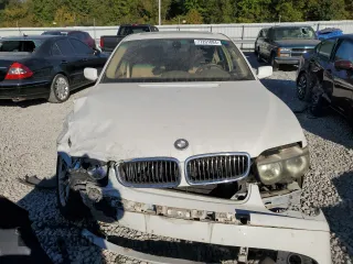 2004 BMW 7 Series 745i with VIN WBAGL63484DP68795, listed as a Copart auction lot 77201084 with 134,044 mi miles and Salvage Title. Bid and sale history available at DreamBid. Image 5.