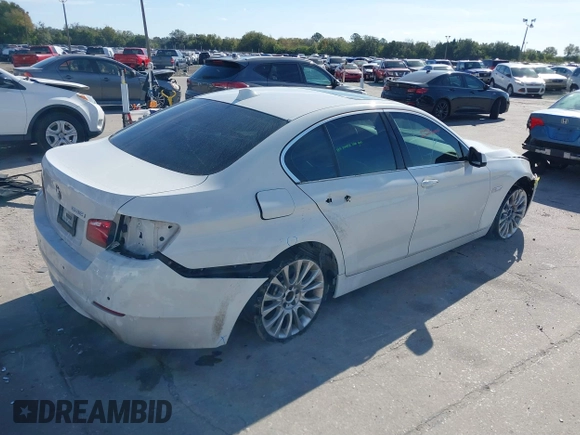 2013 BMW 5 Series 535i with VIN WBAFR7C59DC827660, listed as a IAAI auction lot 41047642 with 131,917 mi miles and . Bid and sale history available at DreamBid. Image 4.
