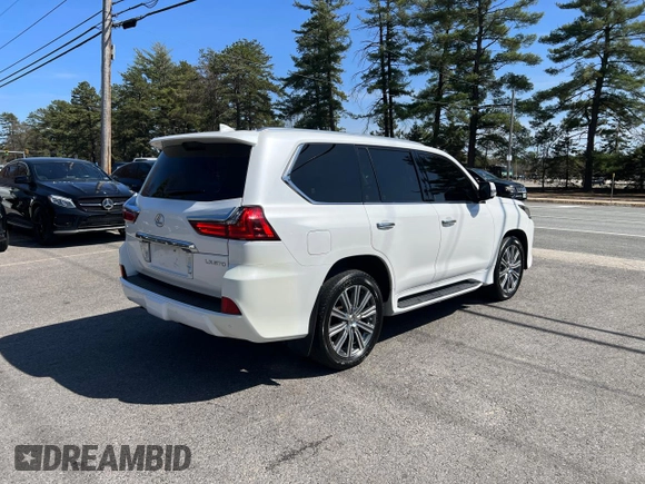 2016 Lexus LX 570 with VIN JTJHY7AX8G4198794, listed as a Copart auction lot 54615015 with 107,196 mi miles and Clean Title. Bid and sale history available at DreamBid. Image 4.