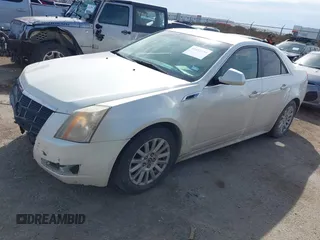 2011 Cadillac CTS Luxury with VIN 1G6DE5EY8B0128460, listed as a IAAI auction lot 41652189 with 294,211 mi miles and . Bid and sale history available at DreamBid. Image 2.