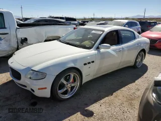 2006 Maserati Quattroporte z VIN ZAMCE39A260026602, wystawiony jako Copart lot #77002534 z przebiegiem 40 771 mil mil oraz Szkody całkowita. Historia ofert i sprzedaży dostępna na DreamBid. Obrazek 1.
