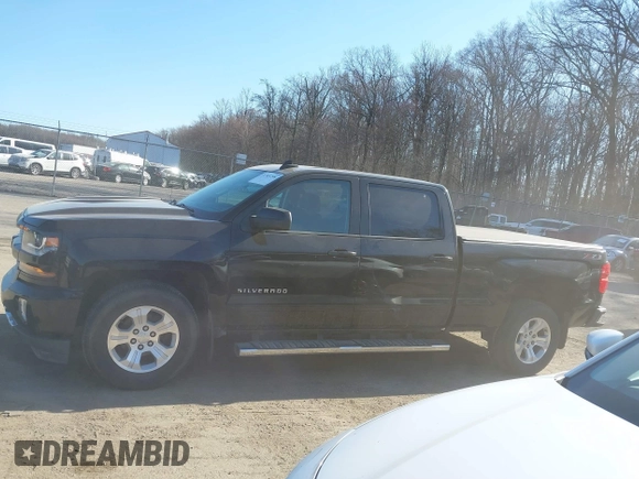 2018 Chevrolet Silverado 1500 LT with VIN 1GCUKREC3JF119906, listed as a IAAI auction lot 41765398 with 122,472 mi miles and . Bid and sale history available at DreamBid. Image 14.