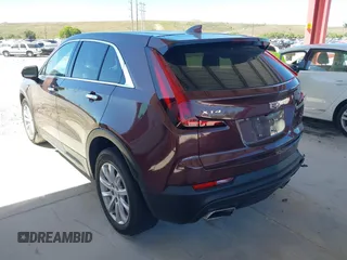 2022 Cadillac XT4 FWD Luxury with VIN 1GYAZAR42NF162880, listed as a IAAI auction lot 41850951 with 47,344 mi miles and . Bid and sale history available at carsss.com. Image 3.