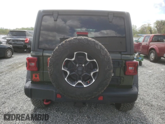 2020 Jeep Wrangler Unlimited Rubicon z VIN 1C4HJXFN9LW315814, wystawiony jako Copart lot #49147855 z przebiegiem 28 902 mil mil oraz Szkoda całkowita • Salvage title. Historia ofert i sprzedaży dostępna na DreamBid. Obrazek 6.