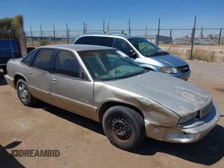 1996 Buick Regal Custom z VIN 2G4WB52M2T1419909, wystawiony jako IAAI lot #42051302 z przebiegiem 156 130 mil mil oraz . Historia ofert i sprzedaży dostępna na DreamBid. Obrazek 1.
