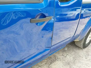 2015 Nissan Frontier SV with VIN 1N6AD0CW1FN767065, listed as a IAAI auction lot 42684729 with 142,212 mi miles and . Bid and sale history available at DreamBid. Image 18.