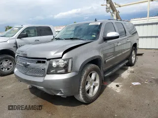 2008 Chevrolet Suburban LTZ with VIN 3GNFK16338G184215, listed as a Copart auction lot 61444685 with 256,028 mi miles and Salvage title. Bid and sale history available at DreamBid. Image 1.