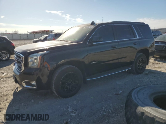 2015 GMC Yukon SLT with VIN 1GKS2BKC6FR508214, listed as a Copart auction lot 48882705 with 182,571 mi miles and Salvage Title. Bid and sale history available at carsss.com. Image 1.