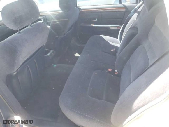 1997 Cadillac DeVille with VIN 1G6KD54Y8VU256755, listed as a Copart auction lot 77669854 with 153,808 mi miles and Clean Title. Bid and sale history available at carsss.com. Image 6.