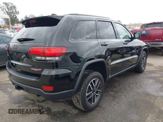 2021 Jeep Grand Cherokee Trailhawk with VIN 1C4RJFLT4MC771773, listed as a IAAI auction lot 42063954 with 17,920 mi miles and . Bid and sale history available at DreamBid. Image 4.