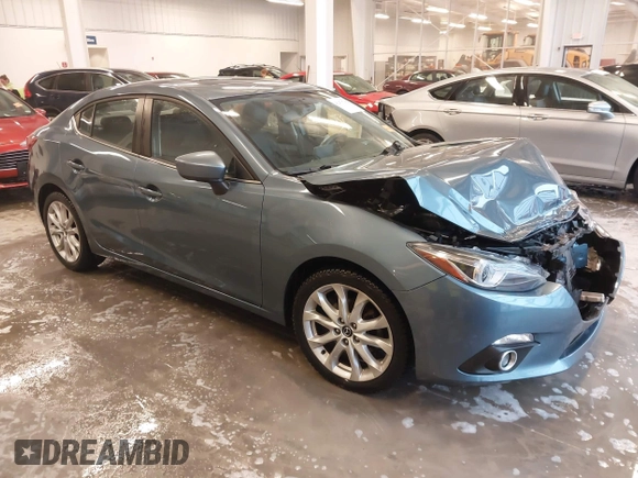 2014 Mazda 3 S Grand Touring with VIN JM1BM1W31E1182703, listed as a IAAI auction lot 41470742 with 123,956 mi miles and . Bid and sale history available at DreamBid. Image 1.
