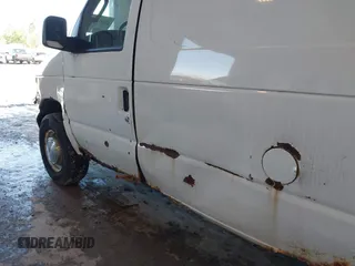2003 Ford Econoline Cargo z VIN 1FTNE24W53HA22180, wystawiony jako IAAI lot #42206484 z przebiegiem 306 921 mil mil oraz . Historia ofert i sprzedaży dostępna na DreamBid. Obrazek 12.