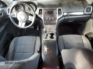 2011 Jeep Grand Cherokee Laredo z VIN 1J4RR4GG0BC518726, wystawiony jako Copart lot #58985765 z przebiegiem 163 625 mil mil oraz Szkoda całkowita • Salvage title. Historia ofert i sprzedaży dostępna na DreamBid. Obrazek 8.