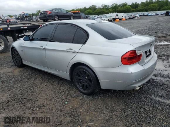 2006 BMW 3 Series 325xi with VIN WBAVD135X6KV00720, listed as a Copart auction lot 58437145 with 148,343 mi miles and Salvage title. Bid and sale history available at DreamBid. Image 2.