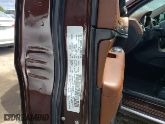 2015 Jeep Grand Cherokee Summit with VIN 1C4RJFJTXFC661574, listed as a Copart auction lot 65592954 with 110,791 mi miles and Salvage Title. Bid and sale history available at carsss.com. Image 13.