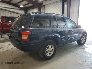 2004 Jeep Grand Cherokee Laredo with VIN 1J4GW48S54C316230, listed as a Copart auction lot 61410875 with 72,083 mi miles and Clean title. Bid and sale history available at DreamBid. Image 3.