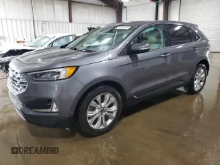 2021 Ford Edge Titanium with VIN 2FMPK4K96MBA38750, listed as a Copart auction lot 61401615 with 34,778 mi miles and Salvage title. Bid and sale history available at DreamBid. Image 1.