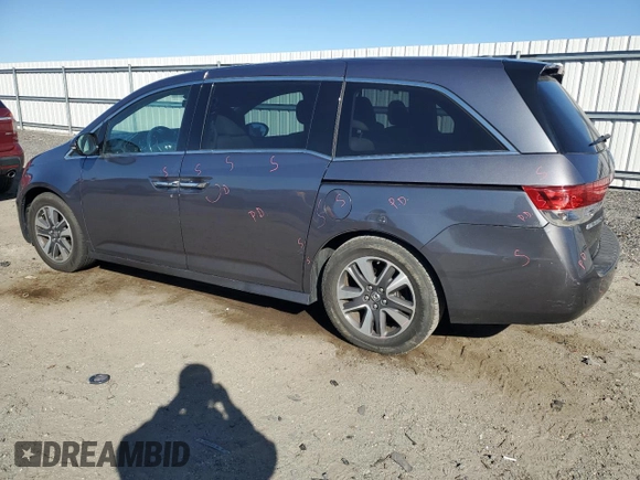 2014 Honda Odyssey Touring with VIN 5FNRL5H96EB061876, listed as a Copart auction lot 49759935 with 132,591 mi miles and Salvage Title. Bid and sale history available at DreamBid. Image 2.