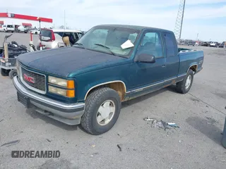 1995 GMC Sierra 1500 z VIN 2GTEK19K1S1520208, wystawiony jako IAAI lot #41835713 z przebiegiem 190 832 mil mil oraz . Historia ofert i sprzedaży dostępna na DreamBid. Obrazek 2.
