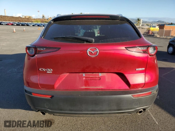 2023 Mazda CX-30 S Carbon Edition z VIN 3MVDMBCM5PM566659, wystawiony jako Copart lot #43979955 z przebiegiem 19 582 mil mil oraz Szkoda całkowita • Salvage title. Historia ofert i sprzedaży dostępna na DreamBid. Obrazek 6.