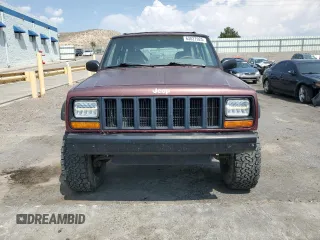 2000 Jeep Cherokee SE with VIN 1J4FF28S9YL133208, listed as a Copart auction lot 63827924 with 0 mi miles and Salvage Title. Bid and sale history available at carsss.com. Image 5.