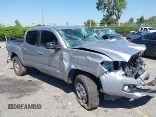 2018 Toyota Tacoma SR with VIN 5TFAX5GN2JX103685, listed as a IAAI auction lot 42392032 with 138,678 mi miles and . Bid and sale history available at DreamBid. Image 1.