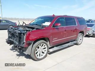 2020 GMC Yukon XL Denali with VIN 1GKS1HKJ3LR238701, listed as a IAAI auction lot 41724274 with 107,323 mi miles and . Bid and sale history available at DreamBid. Image 17.
