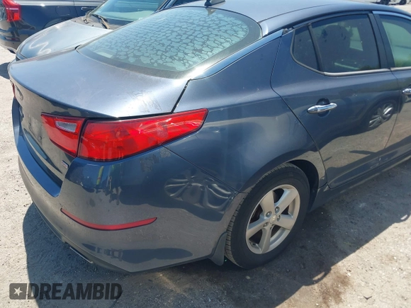 2015 Kia Optima LX with VIN 5XXGM4A77FG440746, listed as a IAAI auction lot 42032775 with 76,494 mi miles. Bid and sale history available at carsss.com. Image 4.