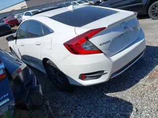 2020 Honda Civic EX-L with VIN 19XFC1F70LE203137, listed as a IAAI auction lot 42028424 with 87,011 mi miles and . Bid and sale history available at DreamBid. Image 3.