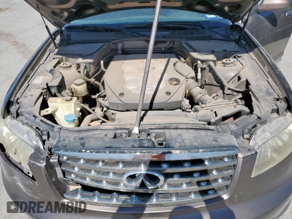 2008 Infiniti FX z VIN JNRAS08W38X203278, wystawiony jako Copart lot #57710405 z przebiegiem 168 007 mil mil oraz Szkoda całkowita • Salvage title. Historia ofert i sprzedaży dostępna na DreamBid. Obrazek 12.