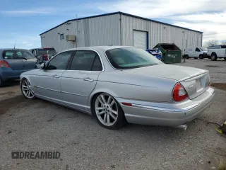 2004 Jaguar XJ with VIN SAJWA73B14TG24590, listed as a Copart auction lot 48438705 with 197,113 mi miles and Clean Title. Bid and sale history available at carsss.com. Image 2.